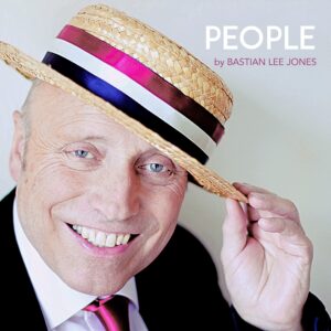 Dieter Starke mit Strohhut und pinkfarbener Krawatte bei einer Portrait-Fotosession mit Bastian Lee Jones
